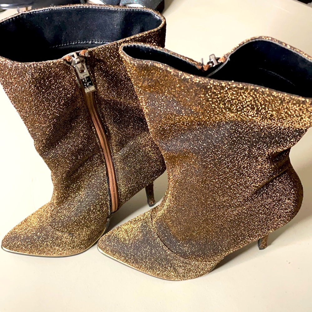 Shin high boots